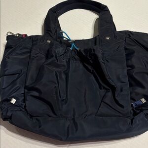 bg by Baggallini Navy cosmetics carry-all, pockets, wet bag, or as a Lunchbox!